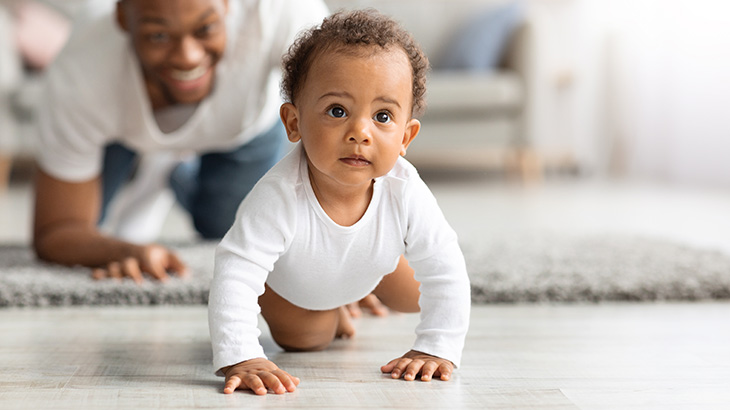 Baby-Crawling-On-Florr-Away-From-Parent